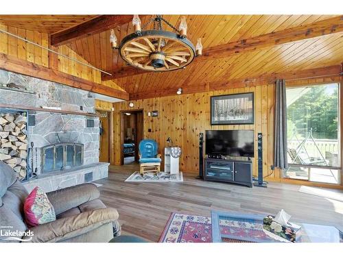 122 Grey Owl Road, Mckellar, ON - Indoor Photo Showing Living Room With Fireplace