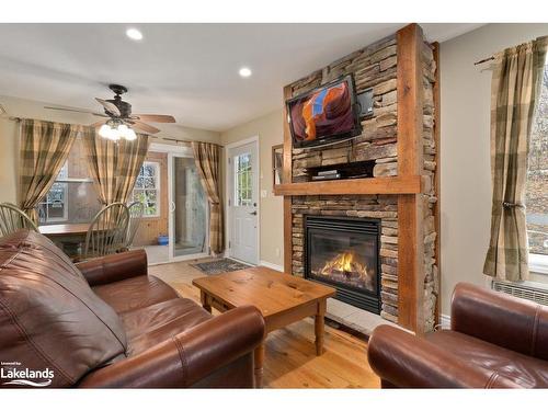 102-1-1052 Rat Bay Road, Lake Of Bays (Twp), ON - Indoor Photo Showing Living Room With Fireplace