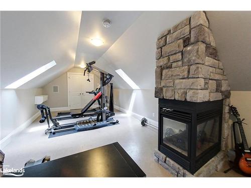11 Forest Drive, Collingwood, ON - Indoor Photo Showing Gym Room With Fireplace