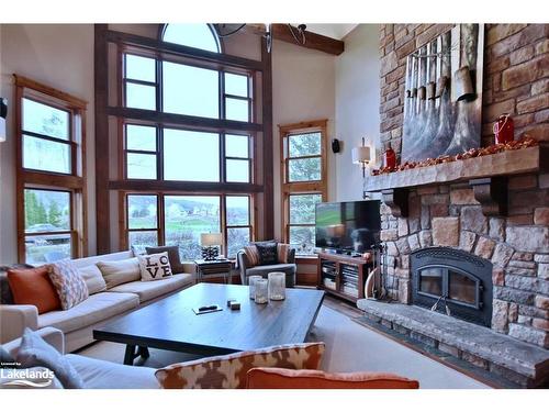 128 Snowbridge Way, The Blue Mountains, ON - Indoor Photo Showing Living Room With Fireplace