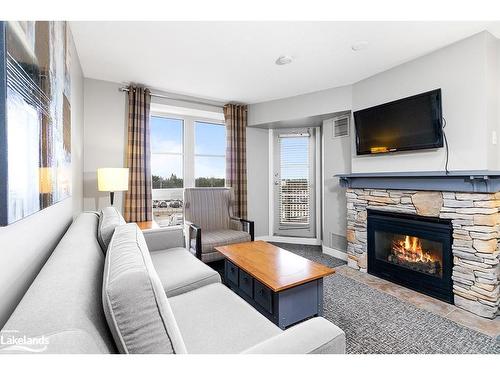 223-170 Jozo Weider Boulevard, The Blue Mountains, ON - Indoor Photo Showing Living Room With Fireplace