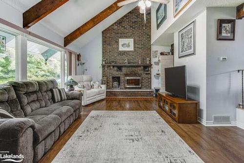 50 Wilson Road W, Tiny, ON - Indoor Photo Showing Living Room With Fireplace