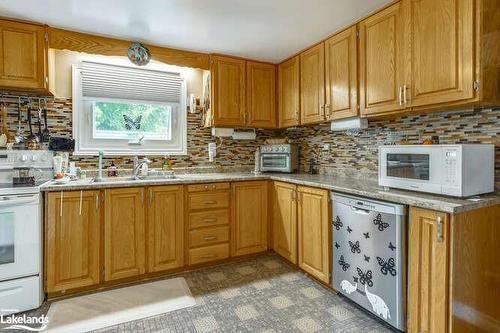 50 Wilson Road W, Tiny, ON - Indoor Photo Showing Kitchen With Double Sink