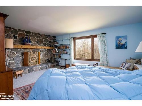 123 Maple Lane Lane, The Blue Mountains, ON - Indoor Photo Showing Bedroom With Fireplace