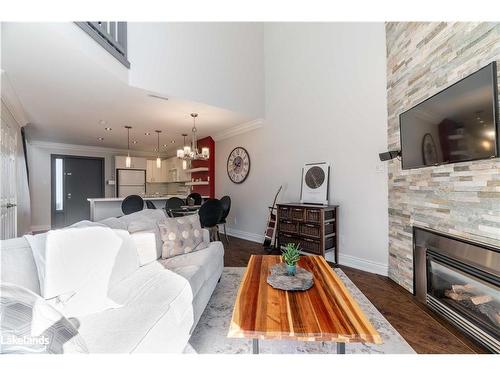 130-55 Trott Boulevard, Collingwood, ON - Indoor Photo Showing Living Room With Fireplace
