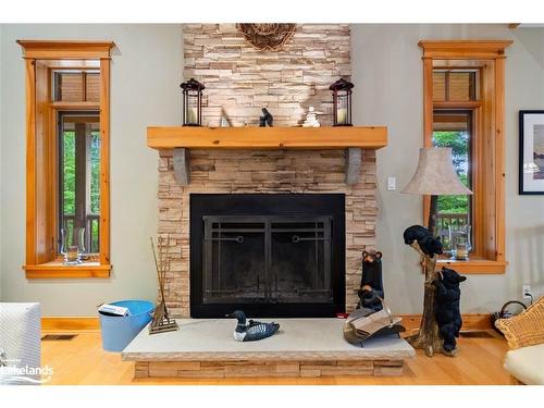 35 Shakell Road, Whitestone, ON - Indoor Photo Showing Living Room With Fireplace