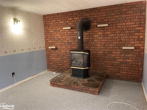 27 Herbert Avenue, Markdale, ON - Indoor Photo Showing Other Room With Fireplace