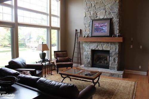 Sandfield 2 Week 1-3876 Muskoka Road 118, Port Carling, ON - Indoor Photo Showing Living Room With Fireplace