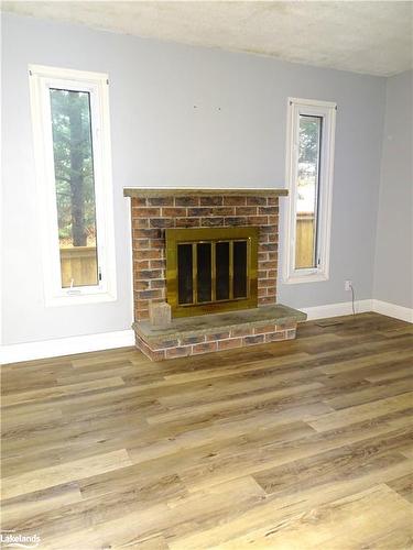 28 Fox Run, Barrie, ON - Indoor Photo Showing Living Room With Fireplace