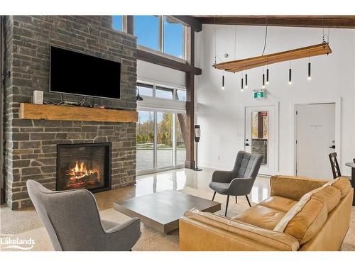 306-20 Beckwith Lane, The Blue Mountains, ON - Indoor Photo Showing Living Room With Fireplace