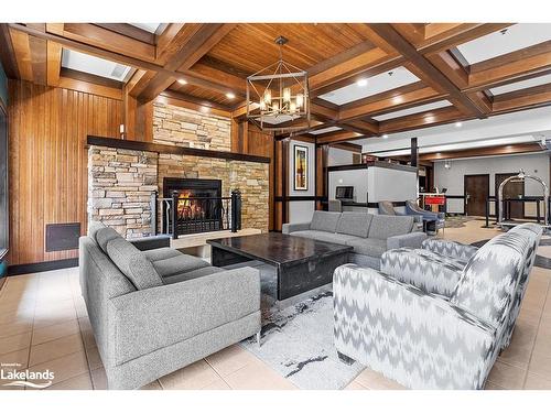 301-190 Jozo Weider Boulevard, The Blue Mountains, ON - Indoor Photo Showing Living Room With Fireplace