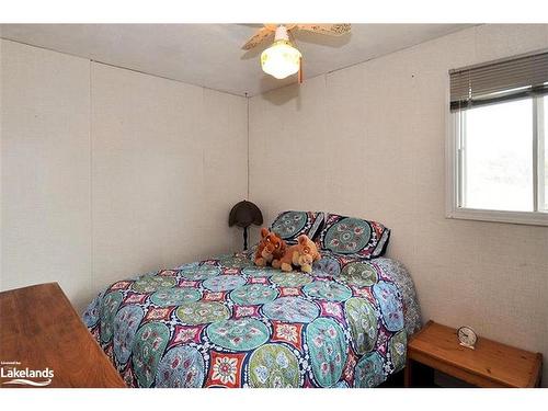 1465 Riverside Drive, Britt, ON - Indoor Photo Showing Bedroom