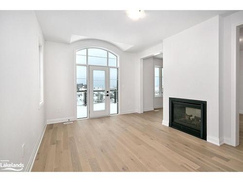5-11 Bay Street E, Thornbury, ON - Indoor Photo Showing Living Room With Fireplace