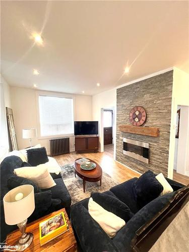 22 St. Paul Street, Collingwood, ON - Indoor Photo Showing Living Room With Fireplace