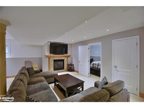 117 62Nd Street S, Wasaga Beach, ON - Indoor Photo Showing Living Room With Fireplace