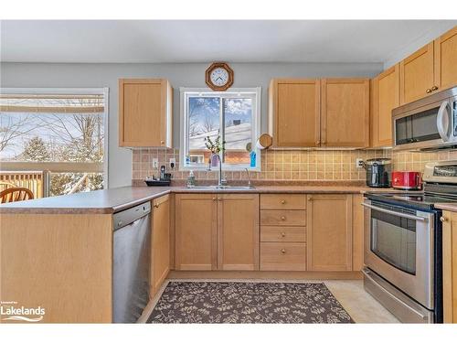 166 58Th Street S, Wasaga Beach, ON - Indoor Photo Showing Kitchen With Double Sink
