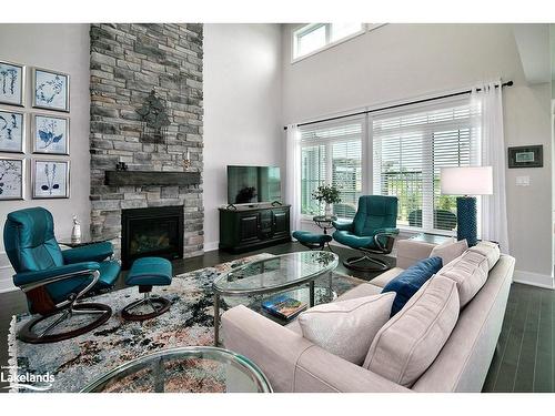 209 Snowberry Lane, Kemble, ON - Indoor Photo Showing Living Room With Fireplace
