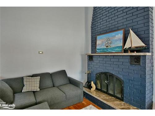 58 River Road E, Wasaga Beach, ON - Indoor Photo Showing Living Room With Fireplace