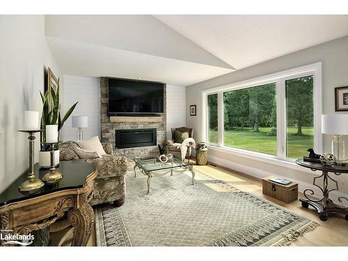 107 Iron Wood Drive, Meaford, ON - Indoor Photo Showing Living Room With Fireplace