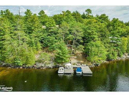 1096 Eilean Gowan Island, Bracebridge, ON - Outdoor With Body Of Water With Deck Patio Veranda