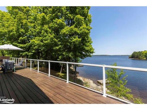29 Shabbotts Bay Road, Whitestone, ON - Outdoor With Body Of Water With Deck Patio Veranda With View