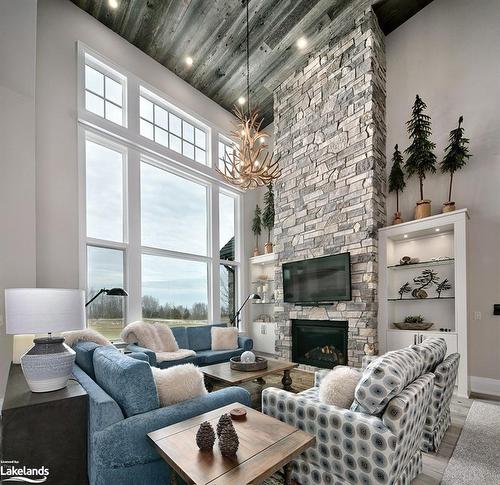 129 Georgian Bay Lane, The Blue Mountains, ON - Indoor Photo Showing Living Room With Fireplace