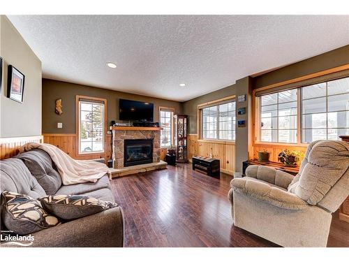 11 Temagami Trail, Wasaga Beach, ON - Indoor Photo Showing Living Room With Fireplace