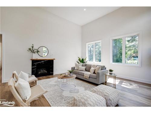 11 Lang Court, Sundridge, ON - Indoor Photo Showing Living Room With Fireplace