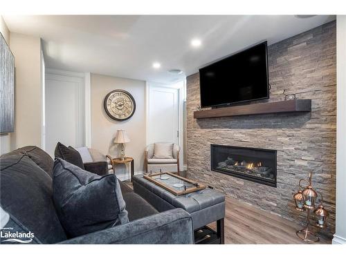 123 Venture Boulevard, The Blue Mountains, ON - Indoor Photo Showing Living Room With Fireplace