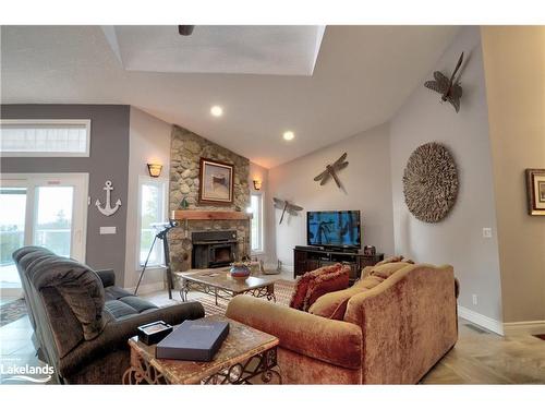 80 Corey Crescent, Tobermory, ON - Indoor Photo Showing Living Room With Fireplace