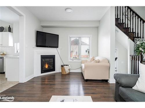 11 Robertson Street, Collingwood, ON - Indoor Photo Showing Living Room With Fireplace
