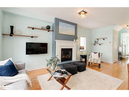 1 Covington Blue Crescent, Wasaga Beach, ON - Indoor Photo Showing Living Room With Fireplace