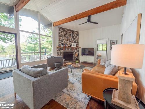 460 Island, Parry Sound, ON - Indoor Photo Showing Living Room With Fireplace