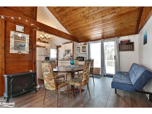 33 17Th Street N, Wasaga Beach, ON - Indoor Photo Showing Dining Room With Fireplace