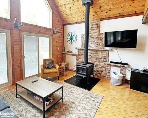 9 Philpark Road, Tiny, ON - Indoor Photo Showing Living Room With Fireplace