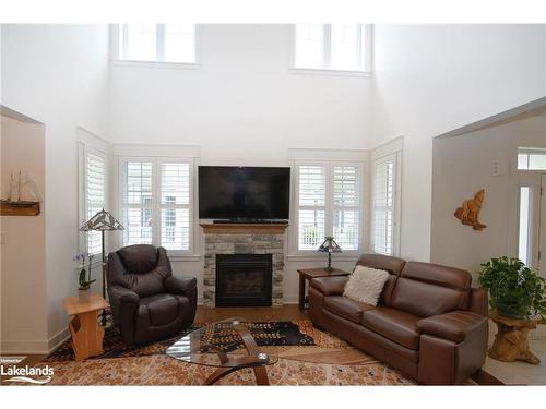 252 Ironwood Way, Kemble, ON - Indoor Photo Showing Living Room With Fireplace