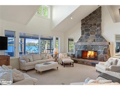 3-4916 Muskoka Road 169, Muskoka Lakes, ON - Indoor Photo Showing Living Room With Fireplace