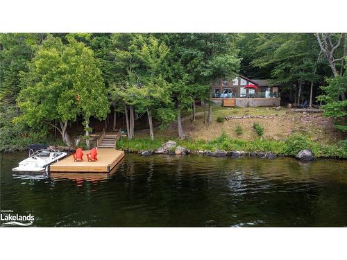 180 Bigwin Island, Baysville, ON - Outdoor With Body Of Water With Deck Patio Veranda