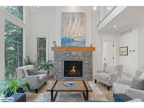 1281 Waldmere Road, Bracebridge, ON - Indoor Photo Showing Living Room With Fireplace
