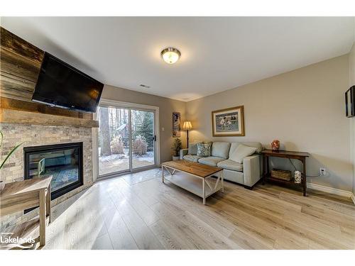 339 Robinson Road, Wasaga Beach, ON - Indoor Photo Showing Living Room With Fireplace