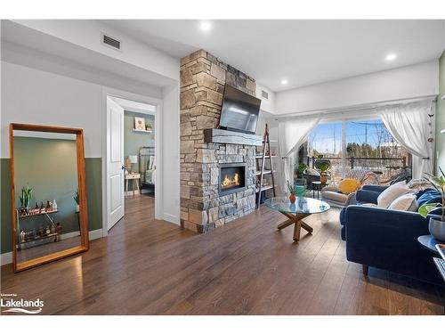 106-11 Beausoleil Lane, The Blue Mountains, ON - Indoor Photo Showing Living Room With Fireplace