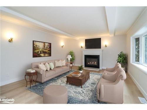 15 Hawthorne Drive, Innisfil, ON - Indoor Photo Showing Living Room With Fireplace