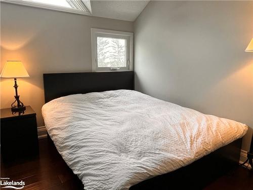 208-796404 19 Grey Road, The Blue Mountains, ON - Indoor Photo Showing Bedroom