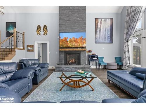 379 Santas Village Road, Bracebridge, ON - Indoor Photo Showing Living Room With Fireplace