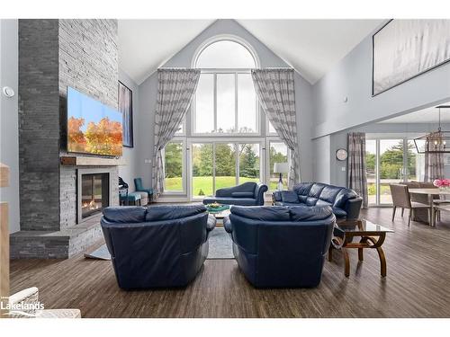 379 Santas Village Road, Bracebridge, ON - Indoor Photo Showing Living Room With Fireplace