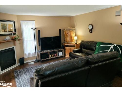 20-1591 Hidden Valley Road, Huntsville, ON - Indoor Photo Showing Living Room With Fireplace