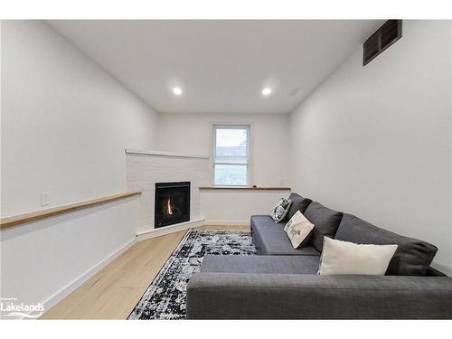 73 Arthur Street E, Thornbury, ON - Indoor With Fireplace