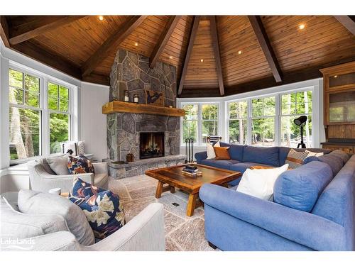 30 Bigwin Island, Baysville, ON - Indoor Photo Showing Living Room With Fireplace