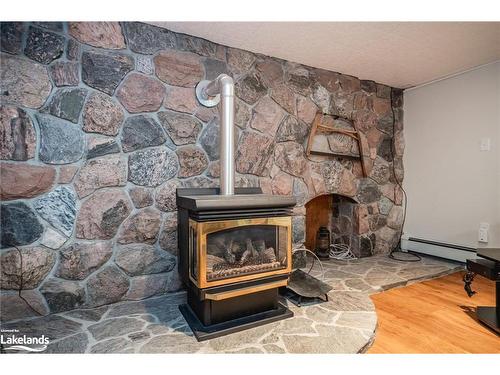48 Poyntz Street, Penetanguishene, ON - Indoor Photo Showing Living Room With Fireplace