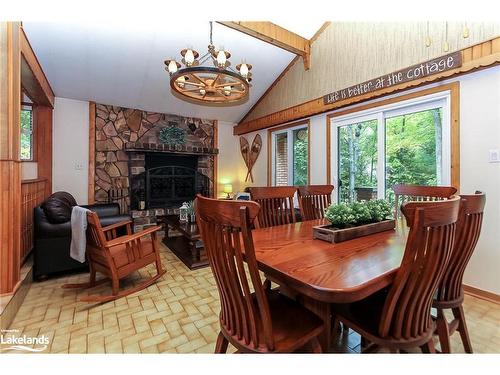 19 Macedonia Circle, Tiny, ON - Indoor Photo Showing Dining Room With Fireplace